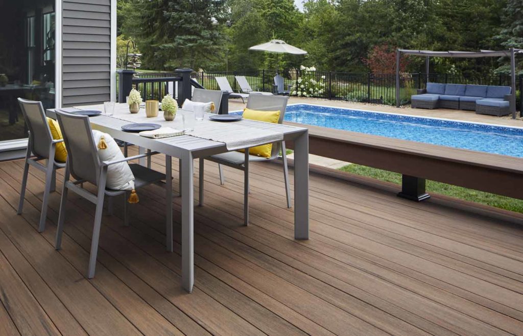 Poolside composite deck with outdoor dining