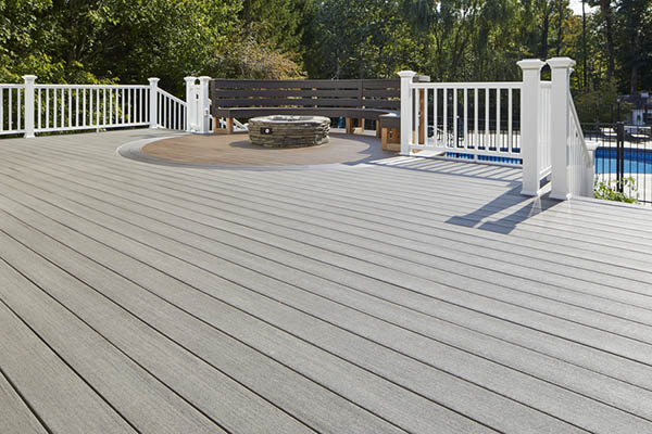 Cool toned light colored composite decking includes Coastline