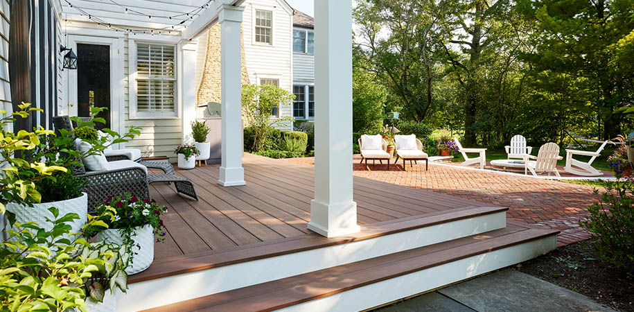 Composite vs wood deck cost shows composite saves you in the long run