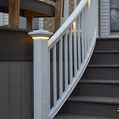 Add post cap lights to your new deck railing