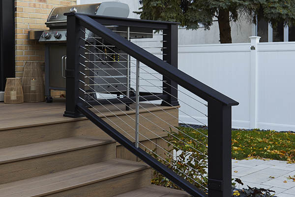 Creating a modern, inviting feel with a deck renovation involving cable rail infill