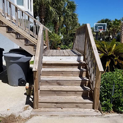 Traditional wood deck railing will fade