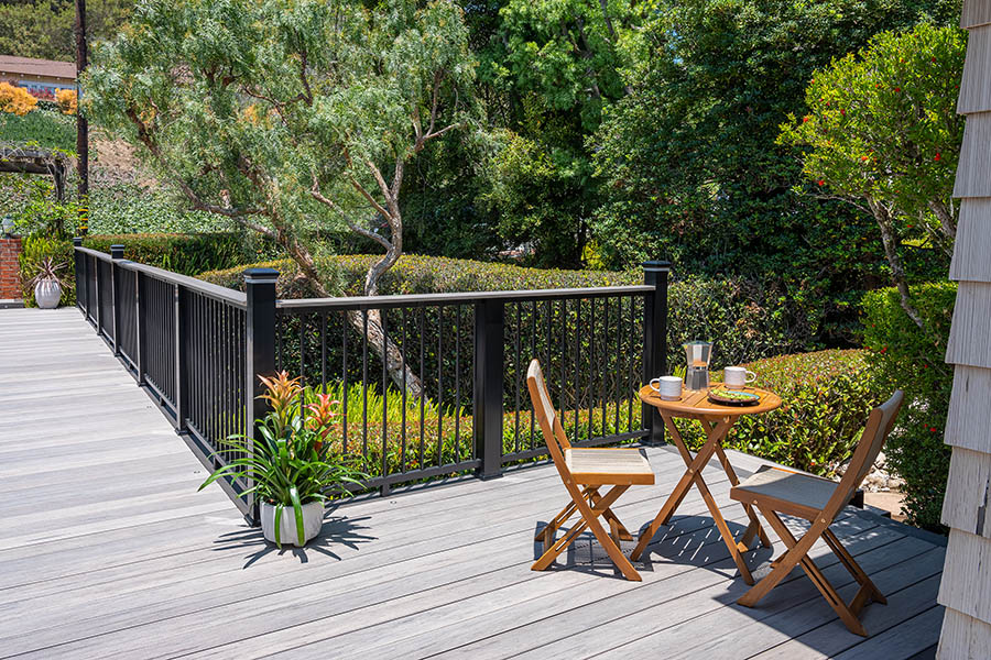Create a sleek modern railing with deck top rail ideas like Ashwood aluminum Drink Rail