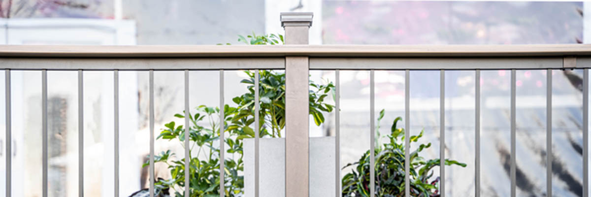 Easy deck railing ideas include Impression Rail Express Drink Rail in Dark Bronze