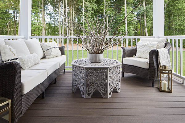 Deck decorating ideas include an attractive focal point such as a coffee table