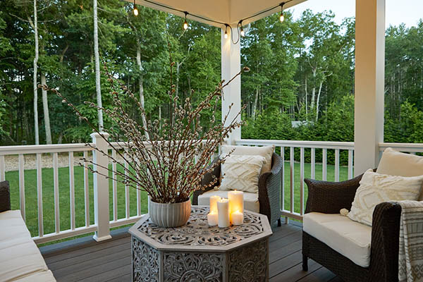 Temporary deck lights like candles lend a warm flickering glow to your space