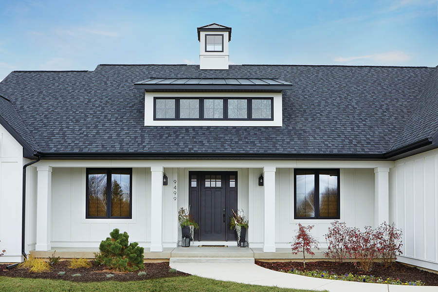 Modern farmhouse-style front porch designs feature clean lines and symmetry with AZEK Exteriors trim and moulding