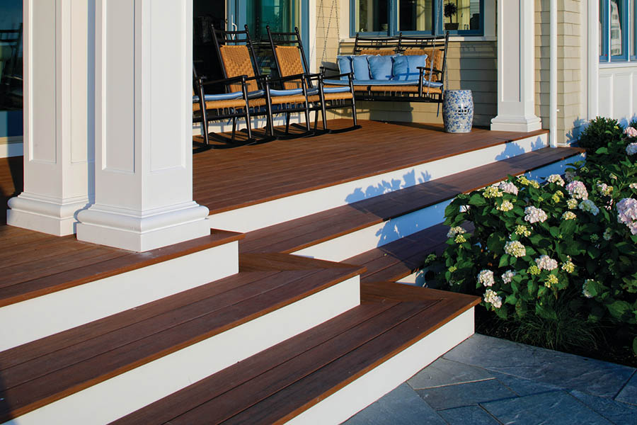 Coastal-style front porch designs and front porch design ideas feature clean white accents