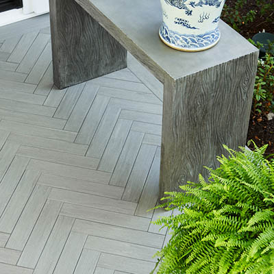 A herringbone deck pattern can make a small space seem large