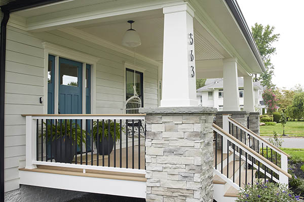 Scandinavian-styled porch remodel ideas featuring mixed materials