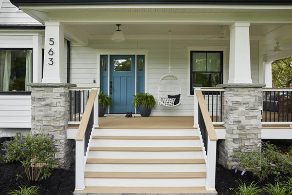 Scandinavian-styled porch remodel ideas featuring neutral colors