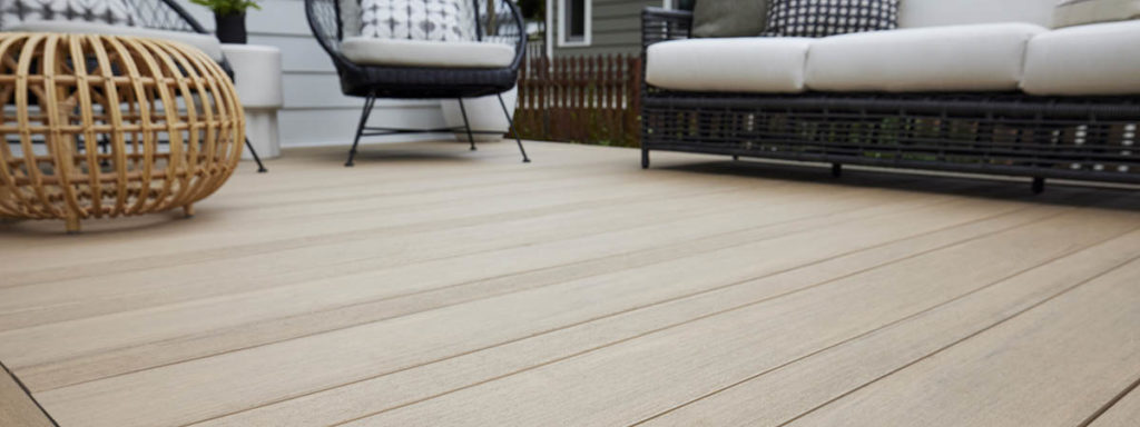 Light tan decking like Weathered Teak is ideal for a composite pool deck