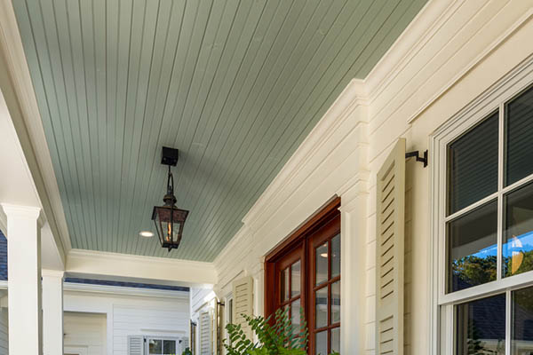Front porch deck ideas include painting your beadboard ceiling blue