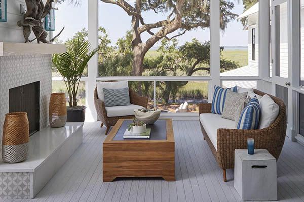 A cool coastal aesthetic for a modern screened in porch