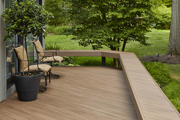 Backyard deck design ideas include diagonal deck boards for narrow decks