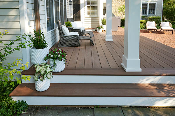 For simple backyard decks add potted plants for greenery