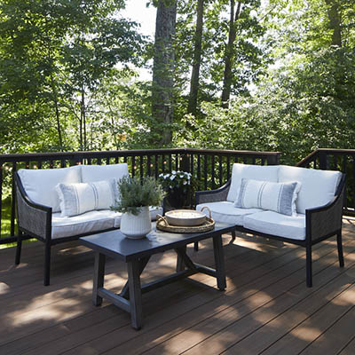 TimberTech composite deck with the best flame spread rating built in a woodland area