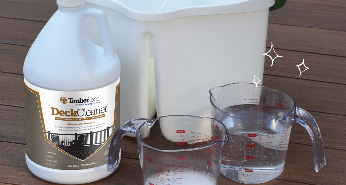 TimberTech's deck cleaner shown next to measuring cups of water and cleaner, and a bucket.
