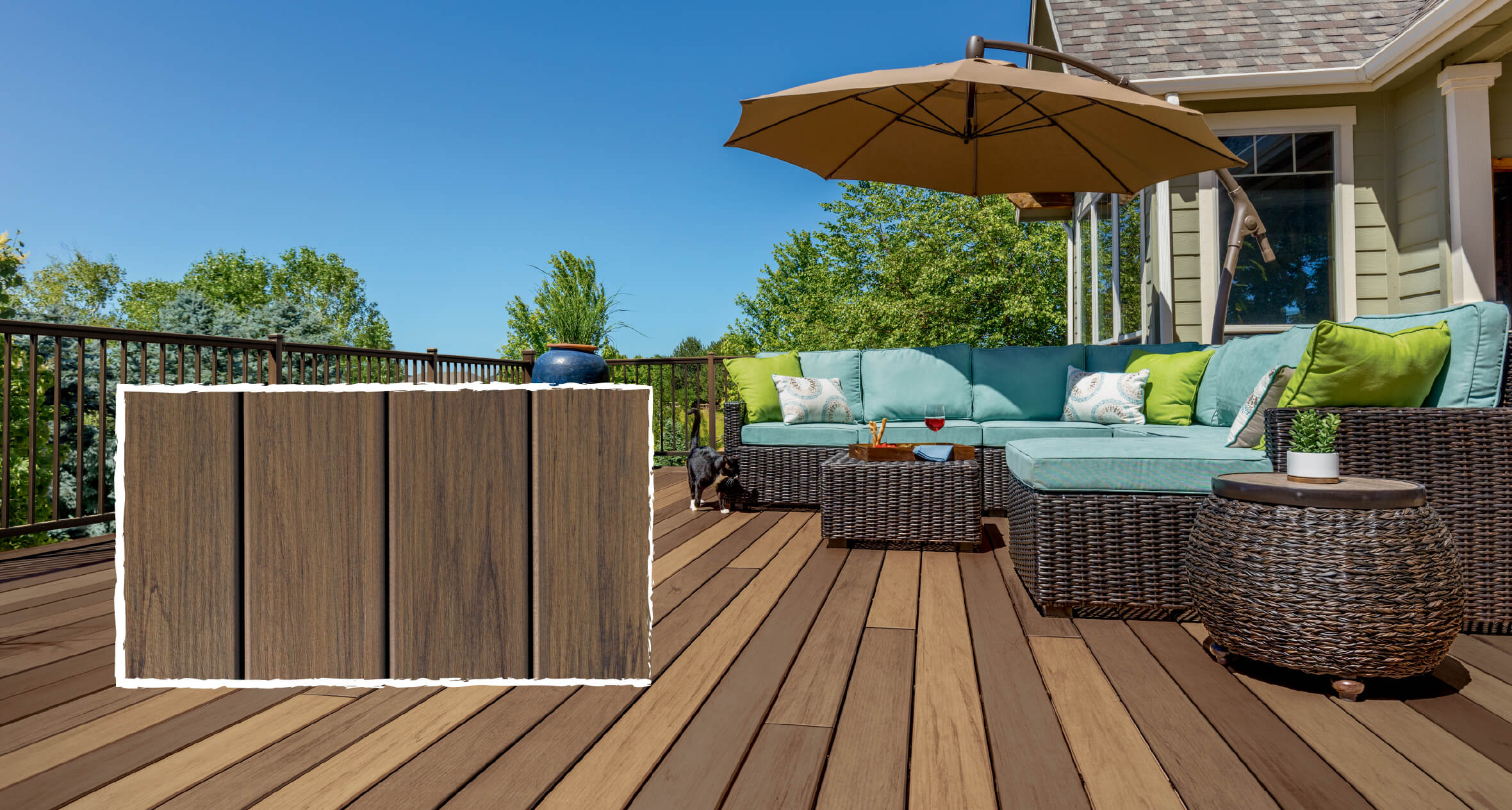 An example of a composite deck with mixed-color decking boards and a blue patio sectional.