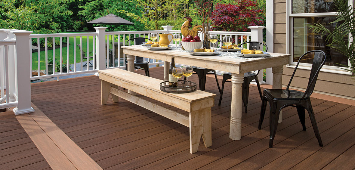 A dining table features individual seats and an extended bench, which can be repurposed for general seating and appetizers, or other uses.