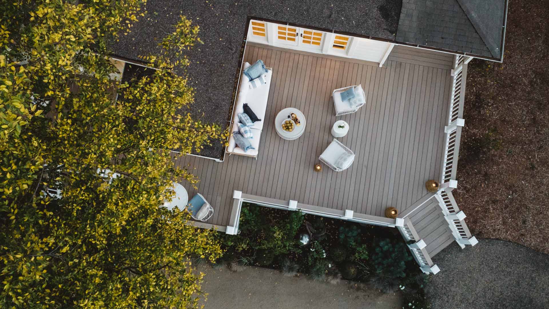 Drone shot of a light tan colored backyard deck