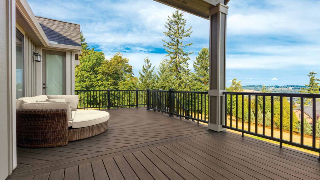 Side view of covered dark brown deck with circular couch