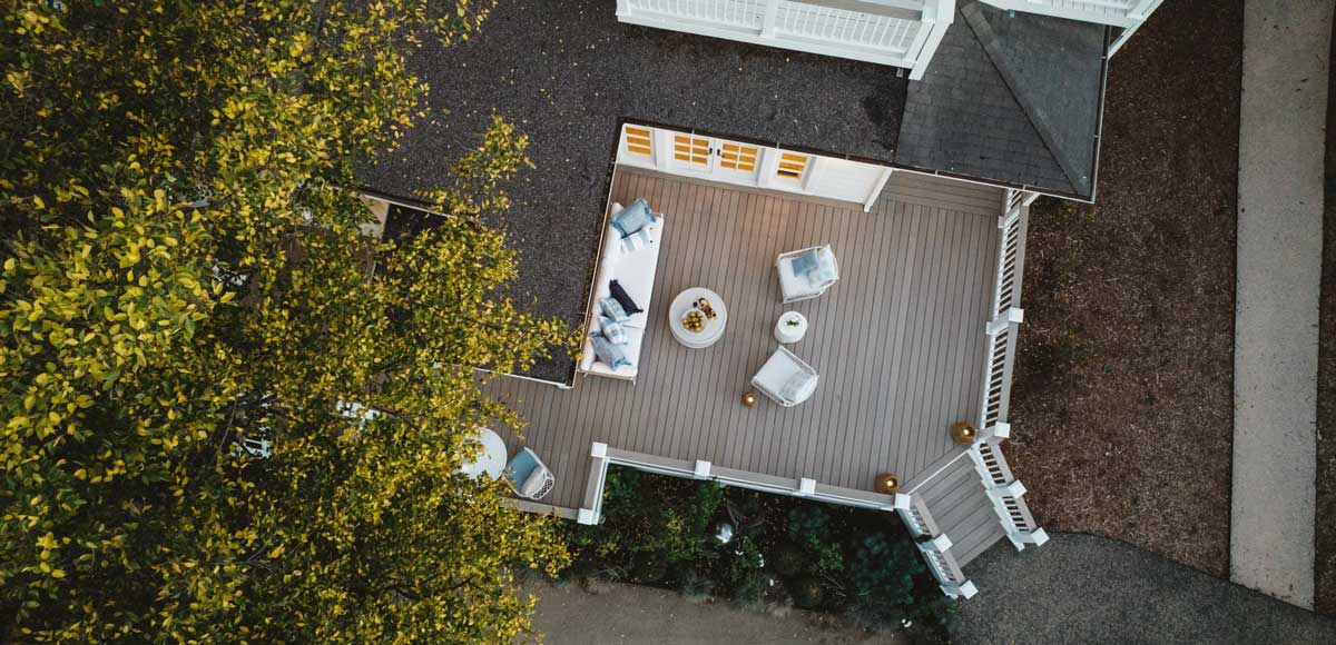 Aerial view of a French White Oak colored deck in a backyard