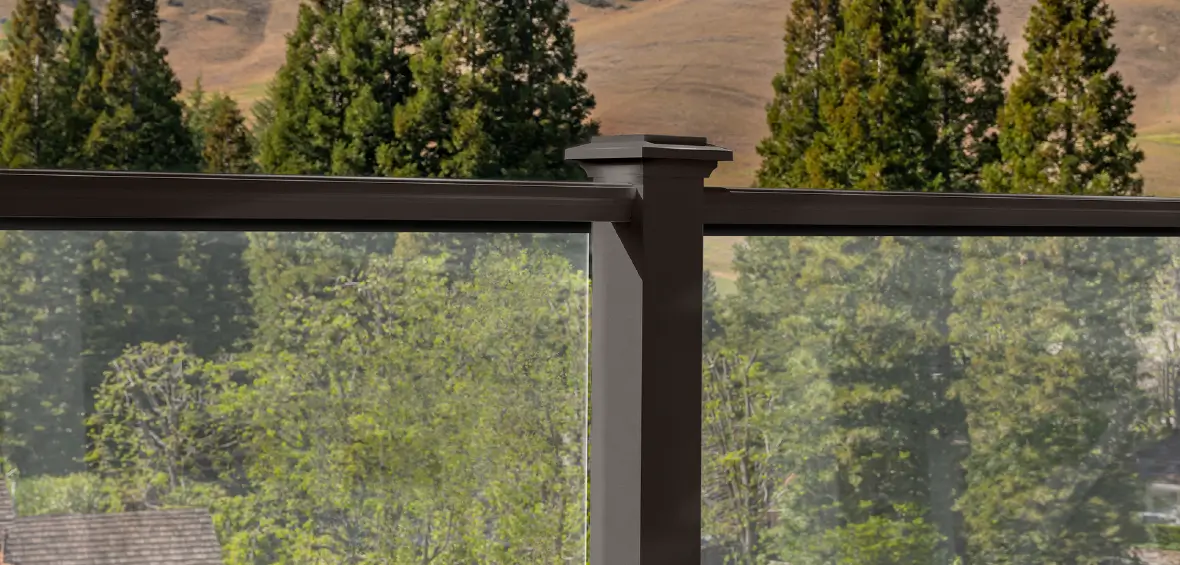 Glass infills in a black aluminum railing.