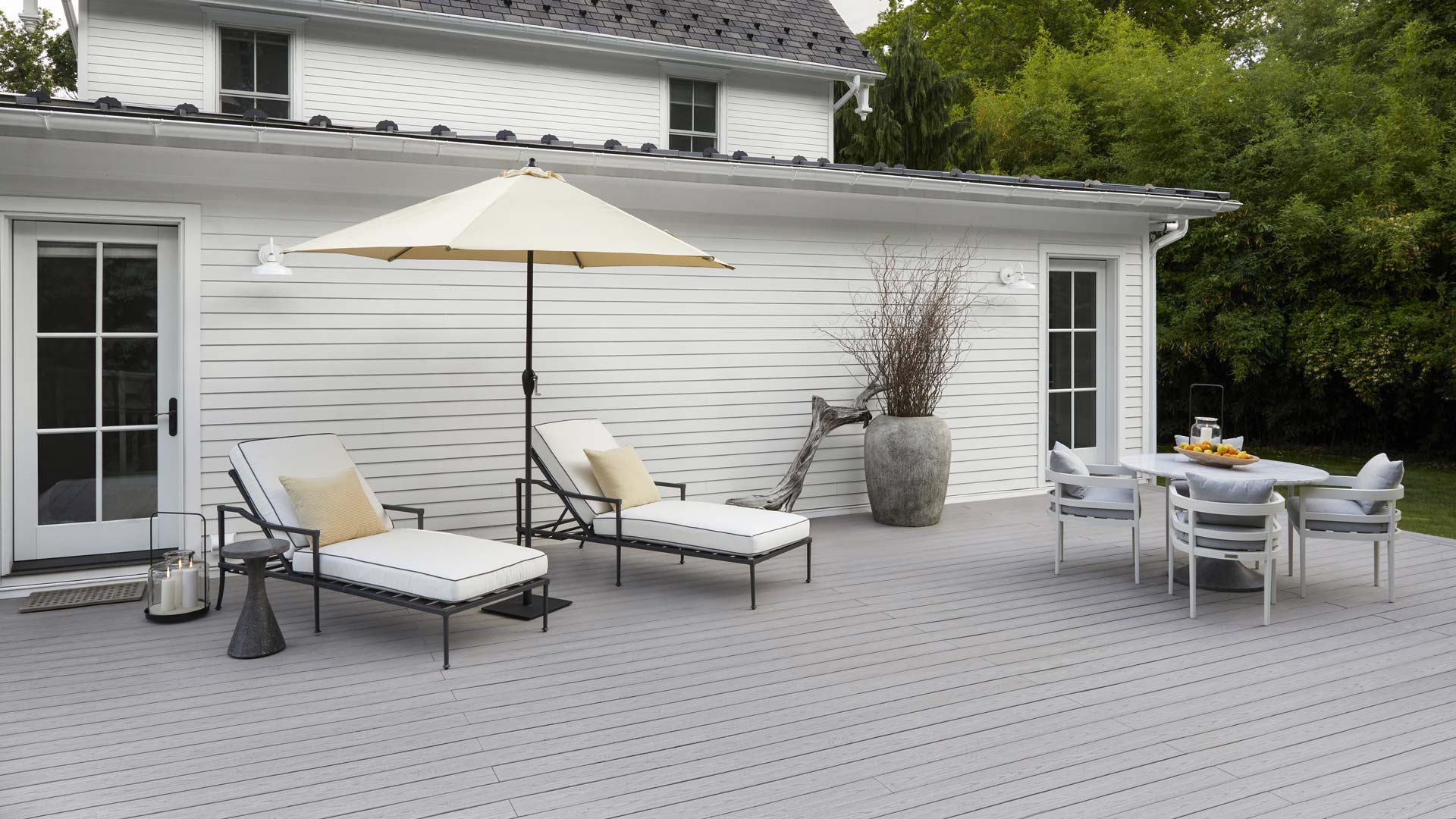 A shot of Danny Seo's new Slate Gray deck and all of his outdoor furniture from afar