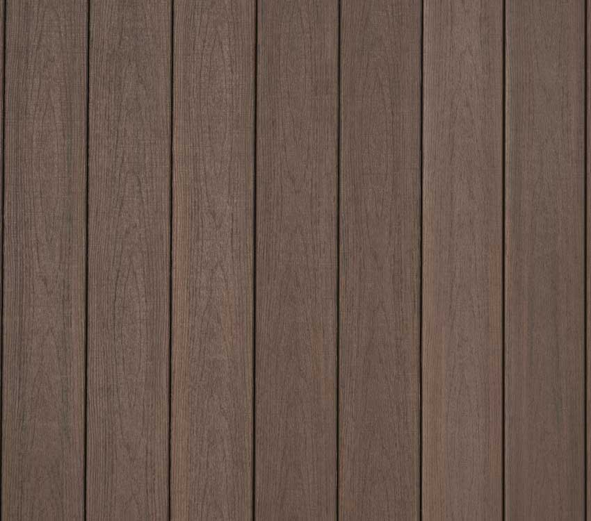 Detail shot of TimberTech Advanced PVC American Walnut deck boards from the Landmark Collection
