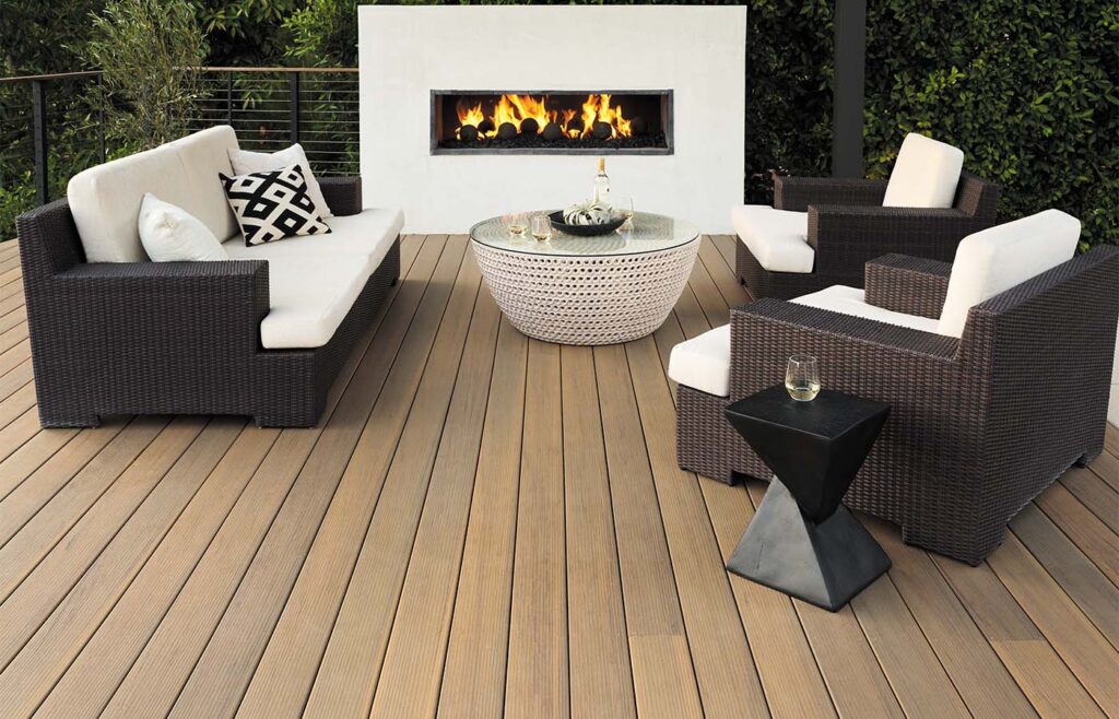 Brown deck with high color variation and outdoor fireplace