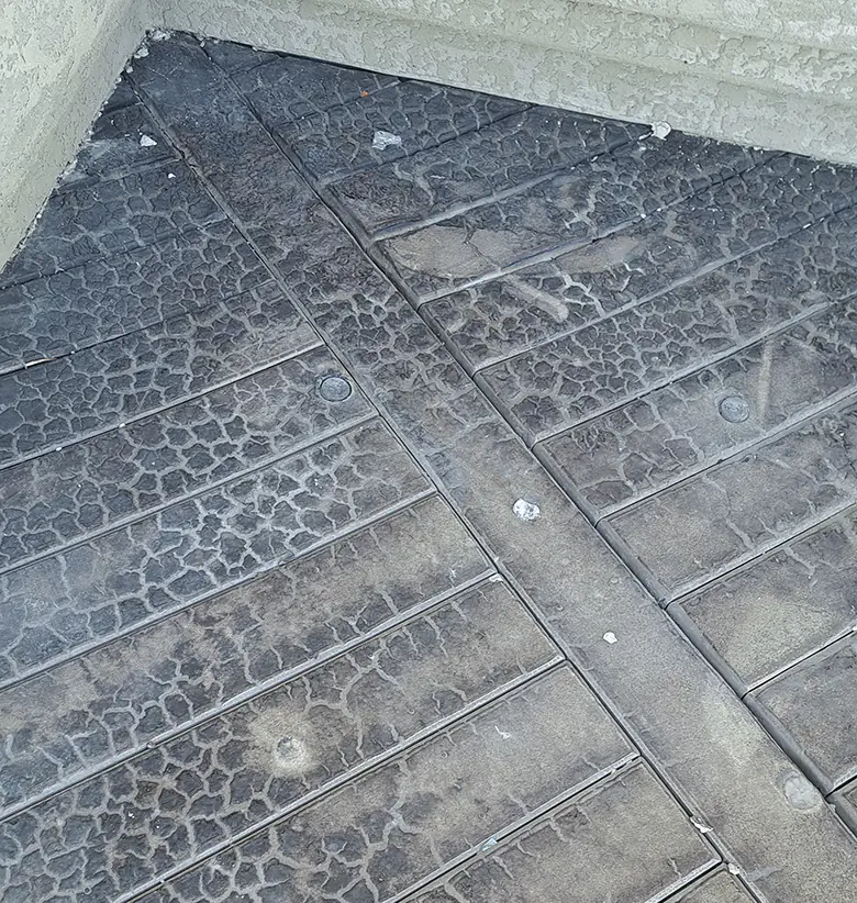 A charred TimberTech deck after withstanding a fire