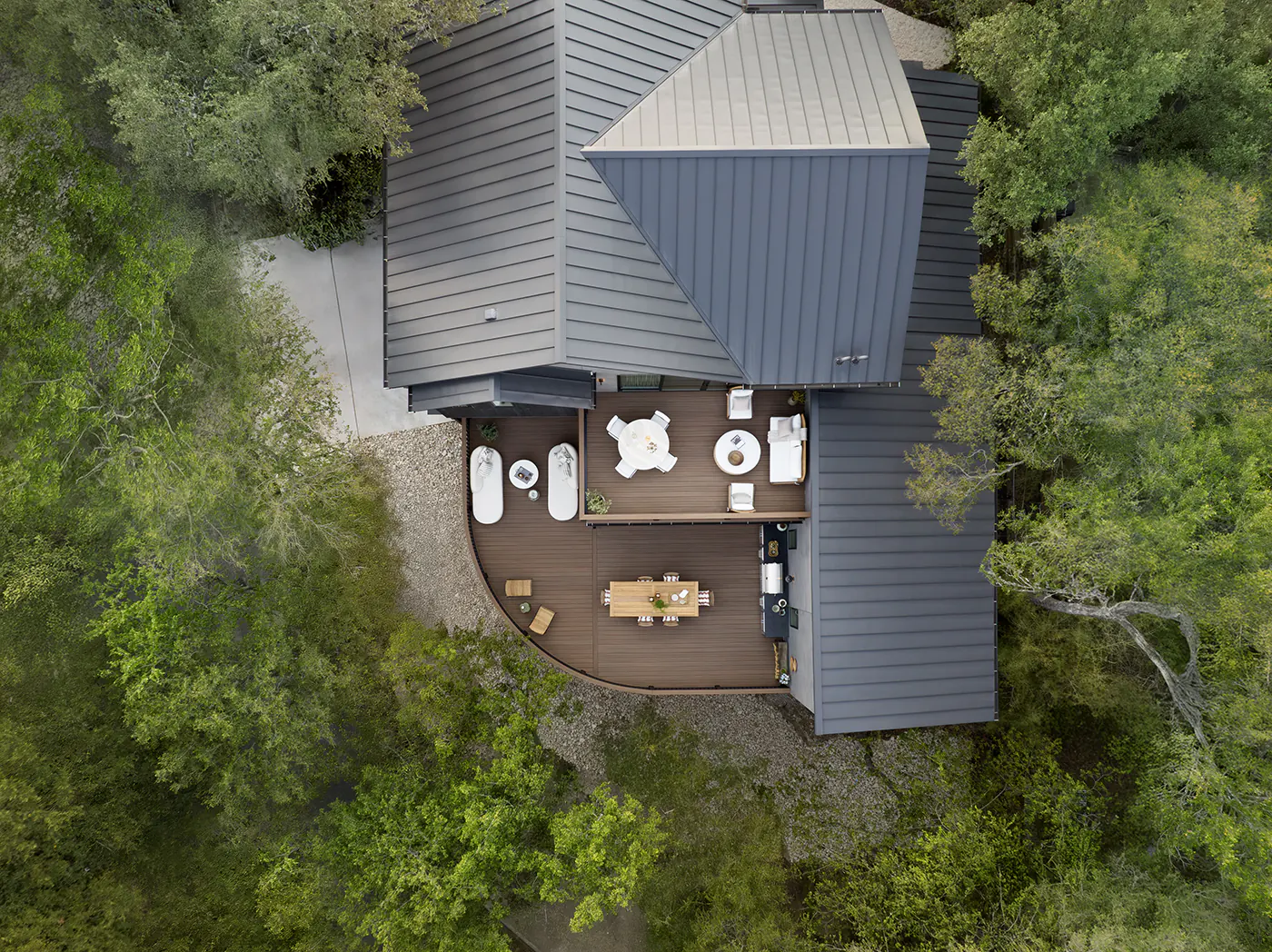 Drone shot displays the massive amount of floor space added to the house as a result of the deck build