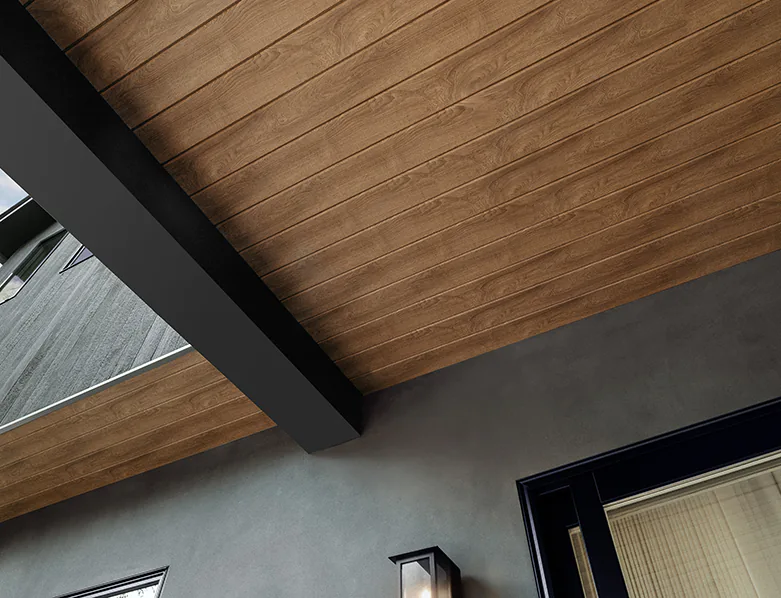 AZEK Exteriors Alpine Trim creates. a real wood look on the ceiling